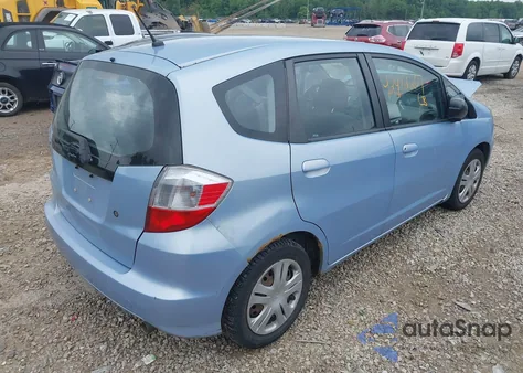 2009 Honda Fit from USA, damaged, VIN JHMGE87219S074372